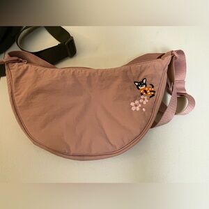 Uniqlo pink round mini shoulder bag with embroidery